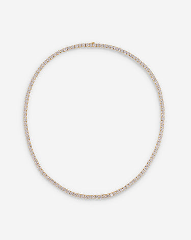 Crystal Embrace goudkleurig tennis ketting, symbool voor zuiverheid en sprankelende energie.