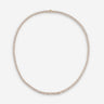 Crystal Embrace goudkleurig tennis ketting, symbool voor zuiverheid en sprankelende energie.